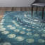 Tapis turquoise à motif abstrait Thursa-20882747