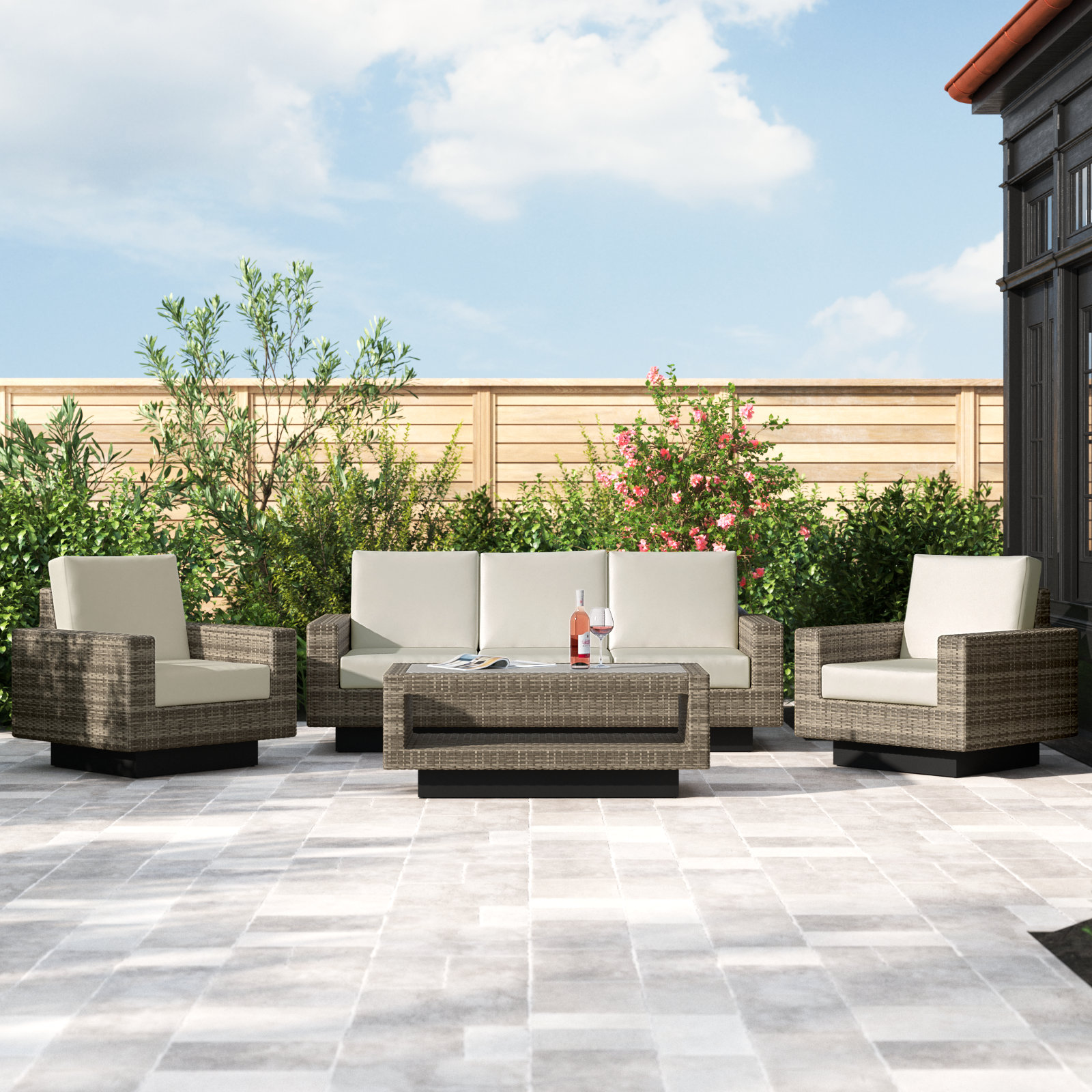 Ravinia 4-Piece Wicker Outdoor Seating Group with Swivel Chairs and Sunbrella Cushions