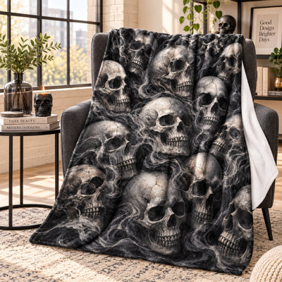Plaid monochrome vintage en flanelle anthracite à effet fumé et motif ivoire répété, idéal pour canapé, salon, lit ou bureau, 76 x 102 cm