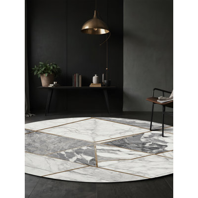 Tapis gris lavable à la machine