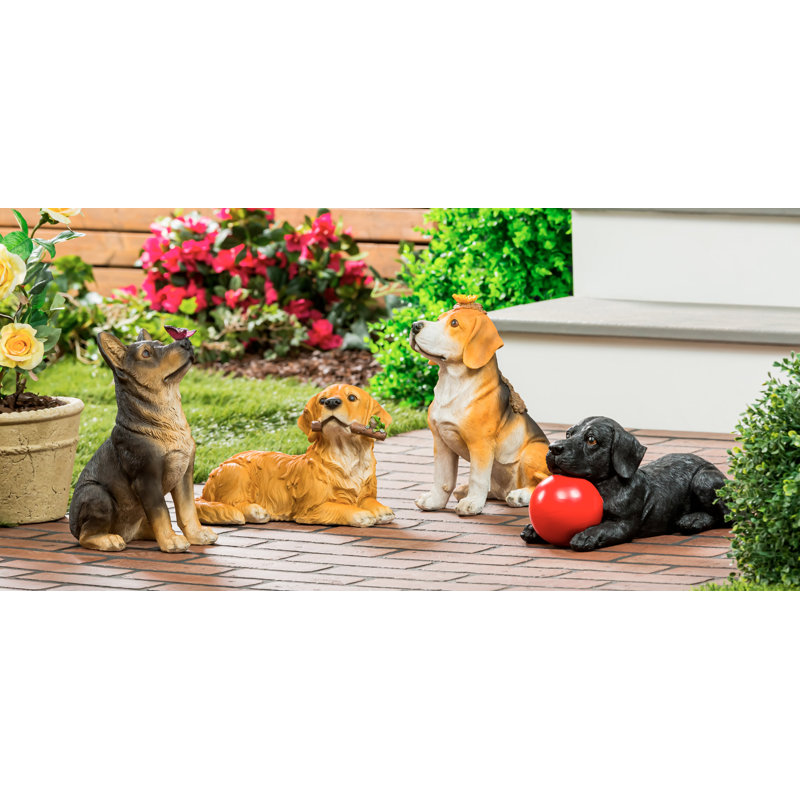 Statue acai berger allemand avec ami papillon