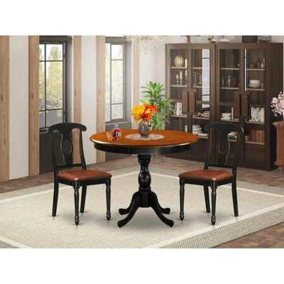 L'ensemble de 3 pièces comprend une table de salle à manger et 2 chaises en similicuir de style Mid-Century avec dossier Napoléon - Finition noire
