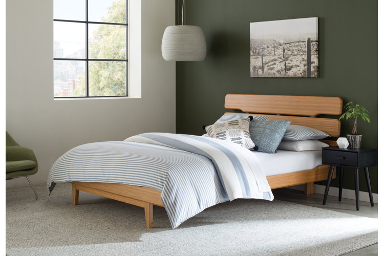 Bed with bamboo bed frame.