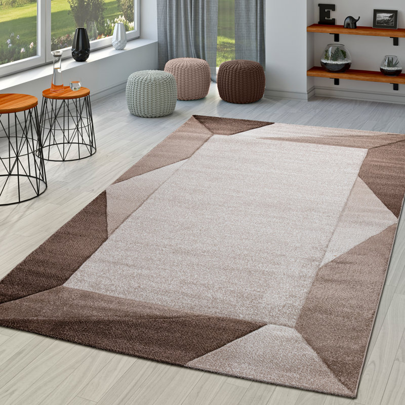 Tapis bordé de motifs géométriques et de contours découpés en beige brun, Rectangle 6 pi 7 po x 9 pi 6 po