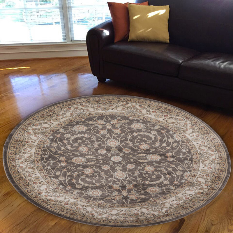 Tapis brun , Rond 5 pi 3 po