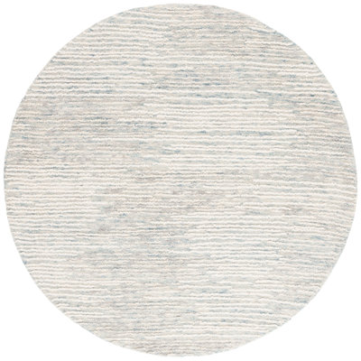 Twaina Abstract Hand Tufted Wool/Cotton Abstract Rug in Ivory/Blue