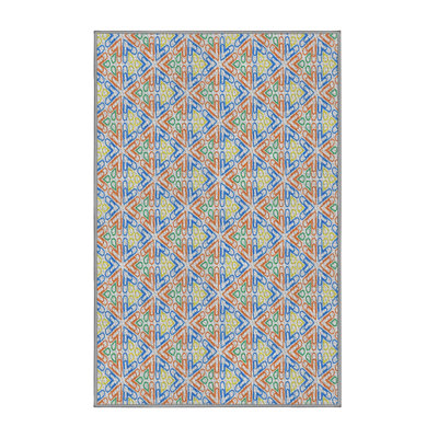 Tapis orange/bleu à motifs