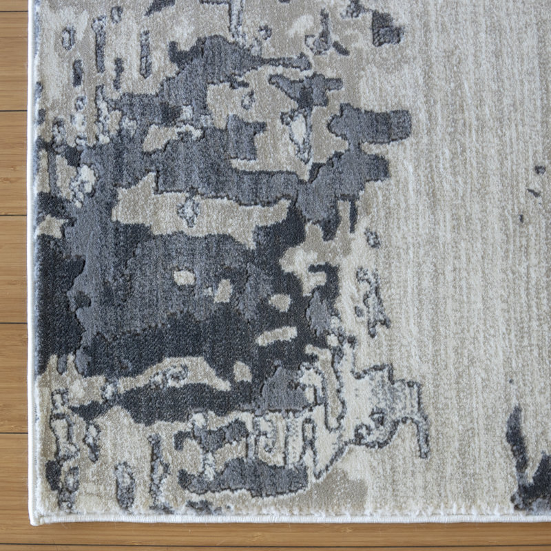 Tapis gris / bleu / ivoire en polypropylène / polyester à motif abstrait moderne Laeh Byrne, Rectangle 6 pi 6 po x 9 pi 6 po