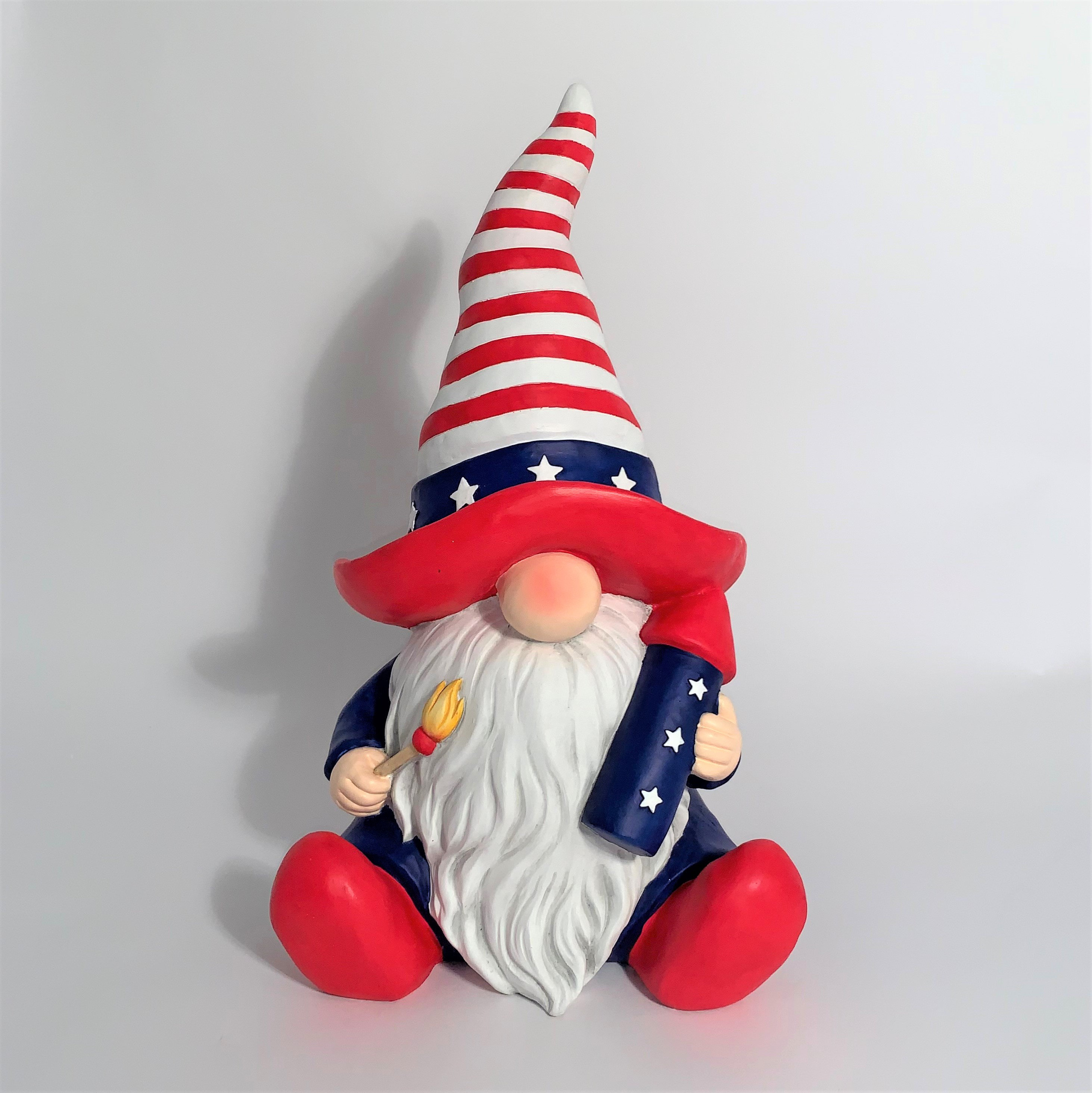 https://assets.wfcdn.com/im/99833700/compr-r85/2148/214820519/magnesium-garden-gnome-holding-firework-rocket-the-americanos.jpg