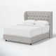 Tomey Upholstered Wingback Bed