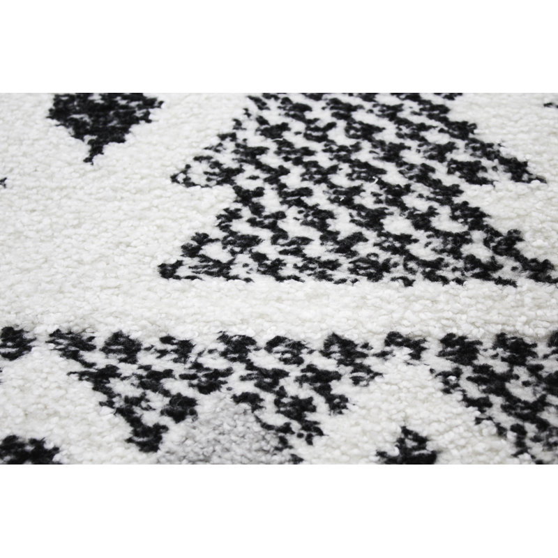 Handmade Geometric Black Synthetic 8' x 10' Stain-Resistant Rug