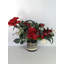Arrangement de roses rouges en soie dans un vase