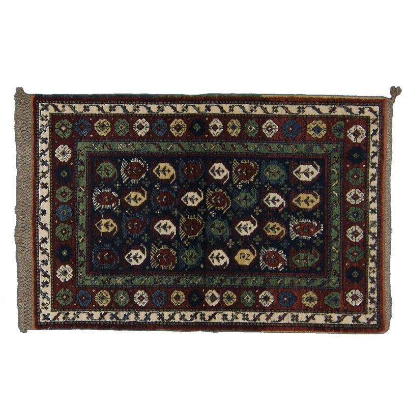 Seychour Wool Oriental Area Rug in Green/Red