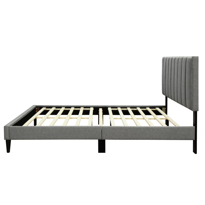 Lit simple à rainure dans une boîte avec tête de lit tapissier gris et motif de charge