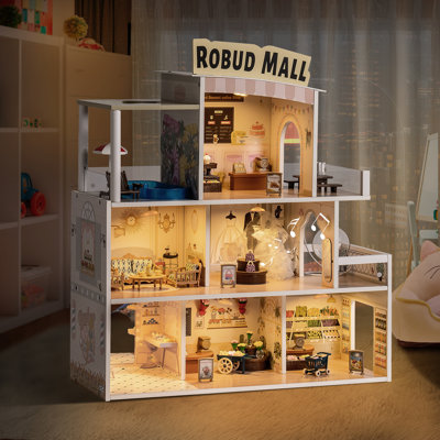 Maison de poupée en bois avec lumière