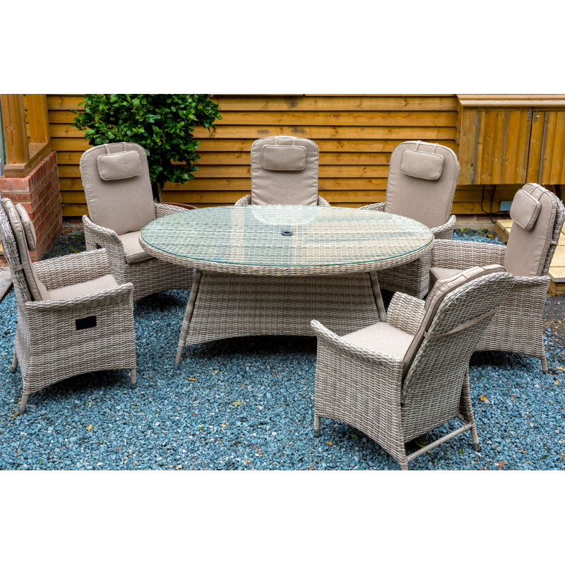 Jaffrey 6 - Person Wicker Patio Dining Set with Oval Table , Cushions Included, Light Brown, Natural