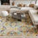 Tapis beige / bleu / orange Whitingham