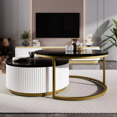 Table basse moderne avec tiroir et capacité de nidification avec finition ronde noire et dorée