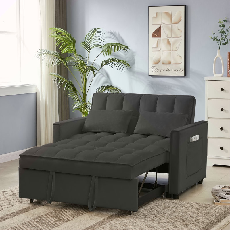 Canapé-lit moderne en velours noir avec dossier réglable et conception capitonnée pour une assise et un sommeil confortables