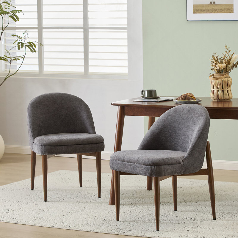 Chaise rembourrée en tissu et fer
