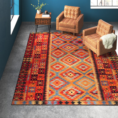 Tapis d'intérieur / extérieur en polypropylène tissé à la machine Lidio - rouge / jaune / bleu