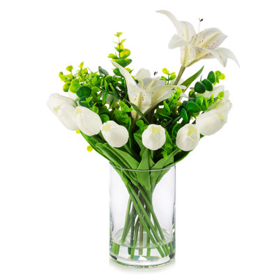 Arrangement floral mélangé dans un vase