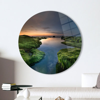 Stunning Glass Wall Art Featuring a Tranquil River Landscape With Green Algae And A Beautiful Sunset For Home Decor
