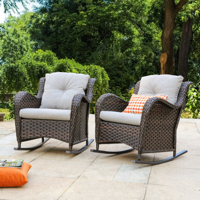 Chaise berçante d'extérieur avec coussins