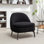 Fauteuil demi-tonneau rembourré Raymond