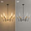 Lustre moderne Sputnik à 6 lumières, or et noir, 111 cm (43,7 po), intensité variable, hauteur réglable de 244 cm (96 po).
