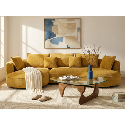 Ensemble de salon de style Mid-Century moderne: canapé modulaire courbé Boucle (jaune, méridienne) + table basse sculpturale en verre avec base en bois