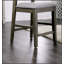 Ensemble de table de salle à manger 7 pièces à hauteur de comptoir avec table grise et chaises rembourrées en tissu, parfait pour les espaces compacts et les maisons urbaines.