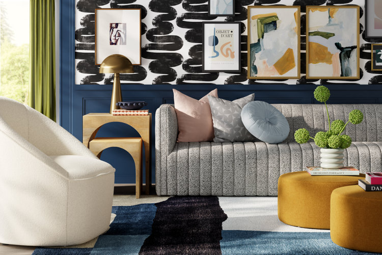 modern living room with a gray sofa, black abstract wallpaper, and yellow ottomans