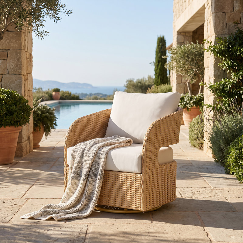 Fauteuil de jardin en osier avec coussins