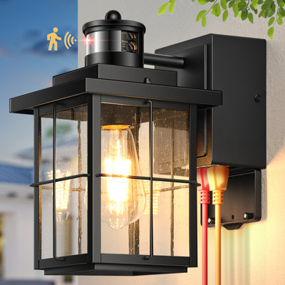 Black Motion Sensor Outdoor Wall Light with GFCI Outlet, Seeded Glass, Waterproof