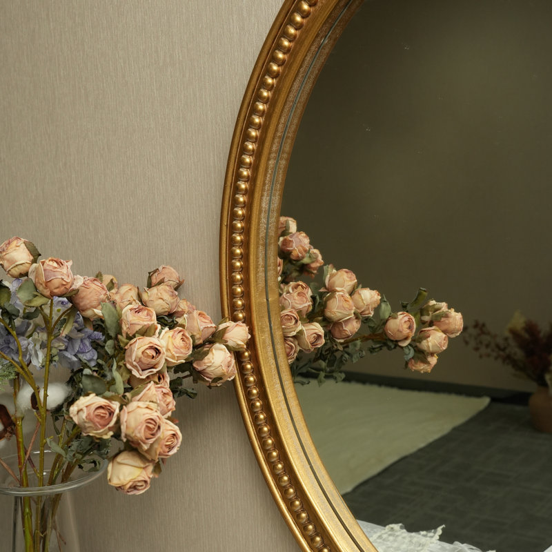 Élégant miroir décoratif ovale mural avec bordure dorée complexe