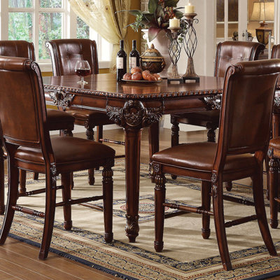 Winfred Extendable Counter Height Table in Cherry