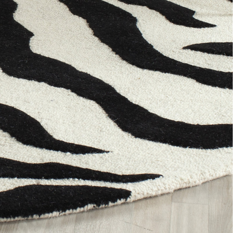 Schell Animal Print Wool Hand Tufted Area Rug, Round 122 cm