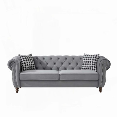 Canapé Chesterfield Ertie avec revêtement en velours et structure en bois massif