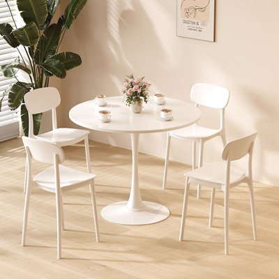 Table de salle à manger blanche élégante avec plateau et support en acier robuste, structure de table de cuisine