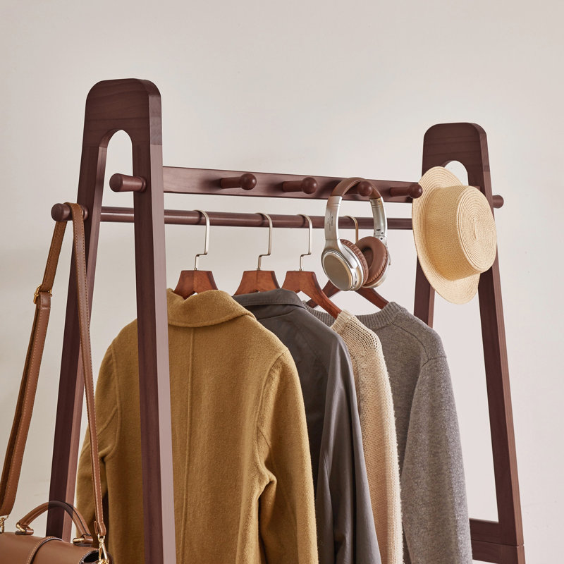 Portant à vêtements en bois massif avec roulettes verrouillables et panier de rangement - Finition noyer
