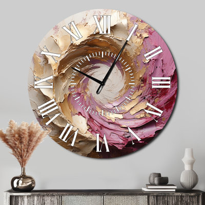 Horloge murale à spirales abstraites et or