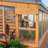 Ensemble de serre d'extérieur en bois de cèdre et polycarbonate de 12 pi x 7 pi avec PowerPort Backyard Discovery Zalie