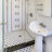 Metro 1" Hex Matte White with Black Dot 10-1/4" x 11-7/8" Porcelain Mosaic Floor and Wall Tile
