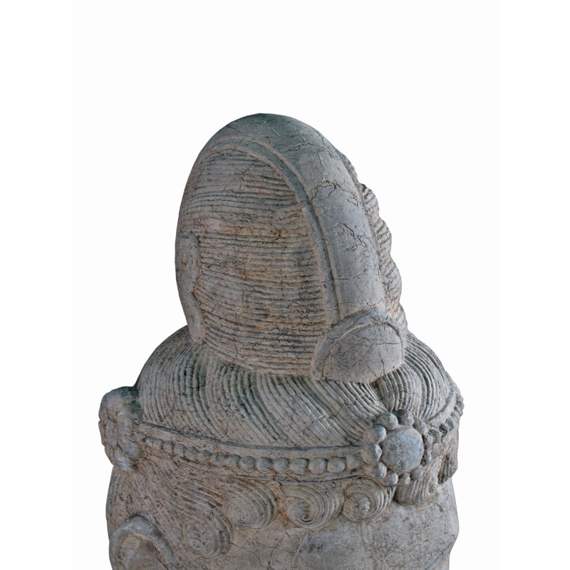 A Stone Statue Of Guanyin Head