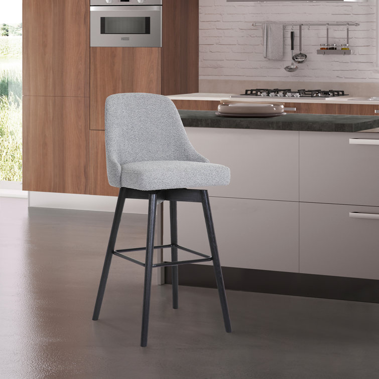 Orfield Modern Swivel Counter or Bar Height Upholstered Armless Bar Stool with Footrest in Wood