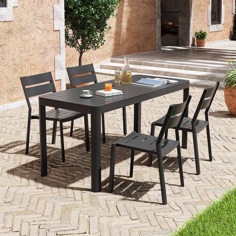 Cadense 4 - Person Aluminum Rectangular Extendable Outdoor Dining Set with Stacking Chairs
