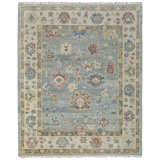Abinesh Wool Floral Area Rug