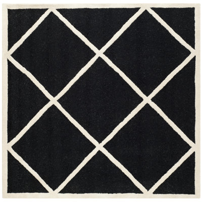 Tapis noir / blanc en laine touffeté à la main Sanyla