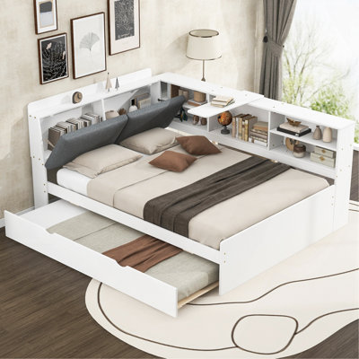 Lit plateforme en bois avec lit gigogne, tablettes et tête de lit en bois